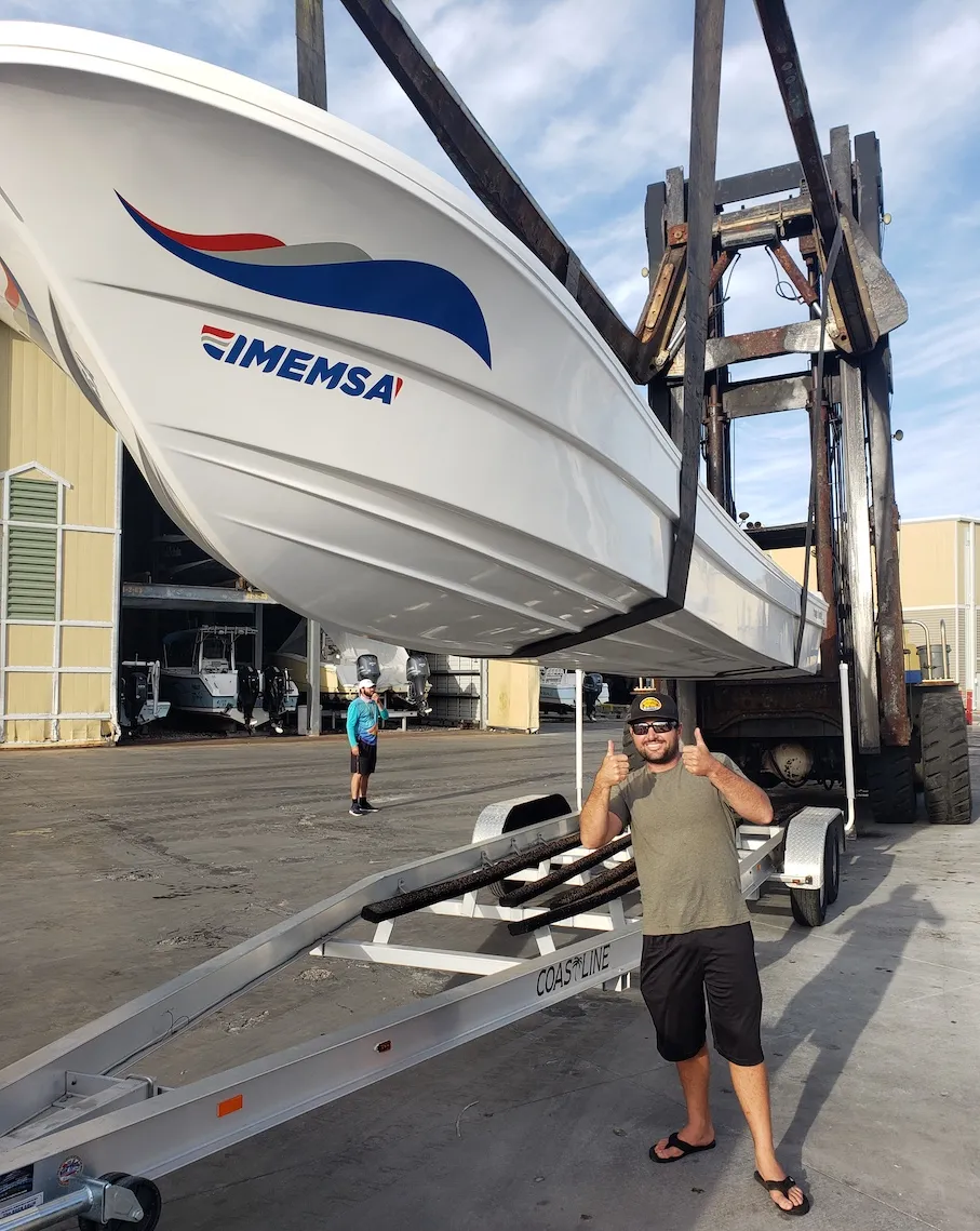 Panga owner with an IMEMSA hull on the shop forklift